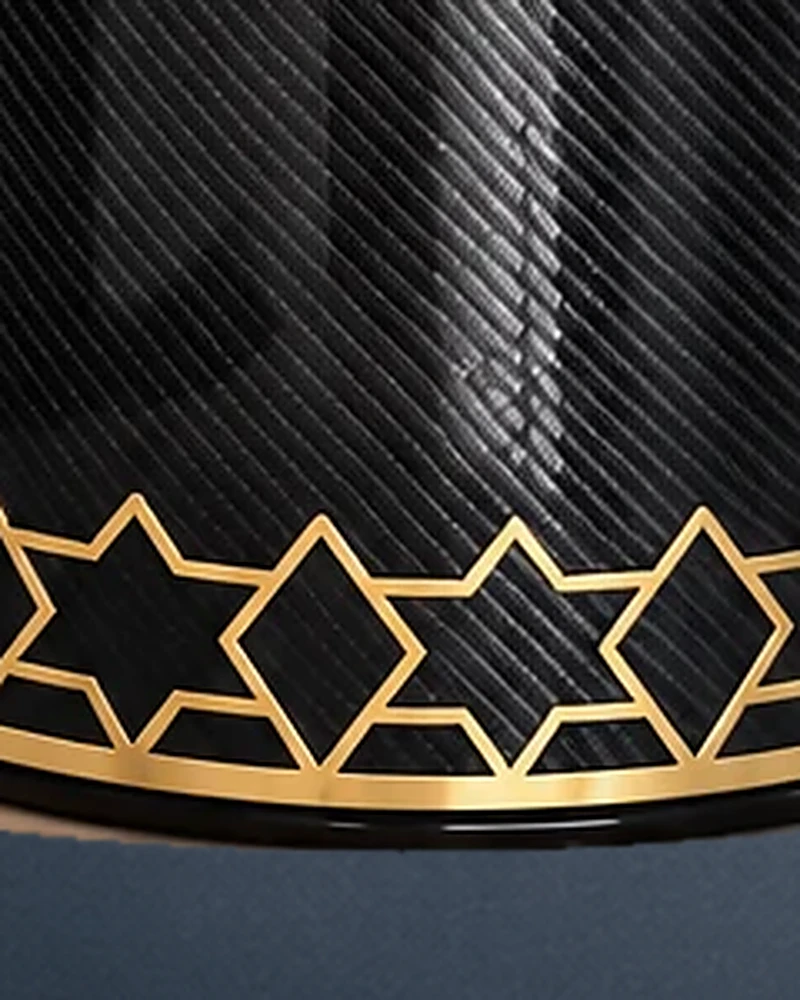 Close-up of the gold Magen David band and carbon-fiber weave
